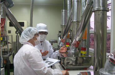 Two Personnel of Realtime Instruments performing Food Processing
